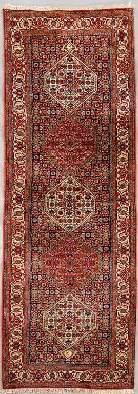 An old Bidjar runner signed and dated 320x88 cm.