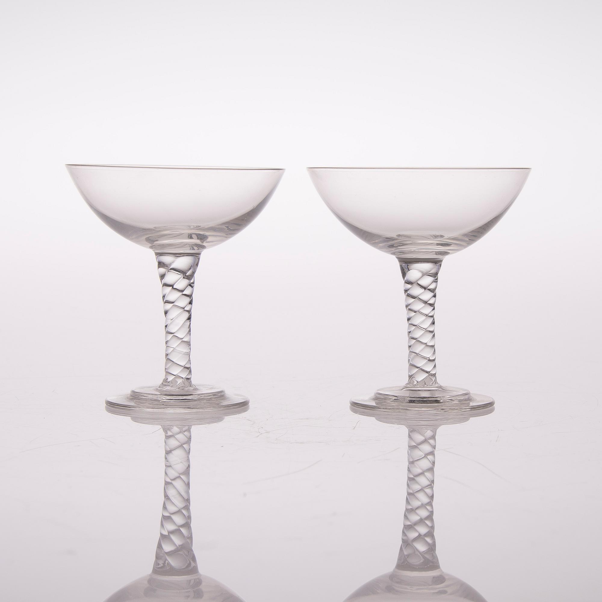A set of twelve liqueur glasses from the first half of the 20th century.
