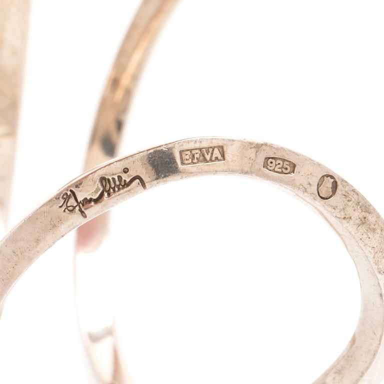 A silver ring and bracelet "loop cuff" by Efva Attling.