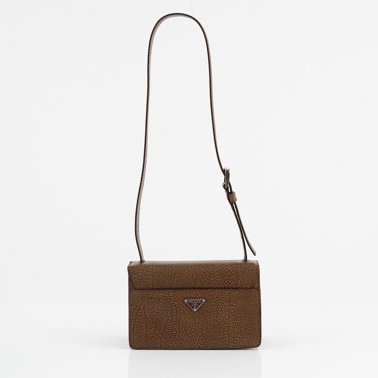 Prada, a brandy colored bag.