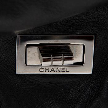 A Black Leather Double Mademoiselle Lock Flap Bag.