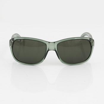 Gucci, a pair of green sunglasses.