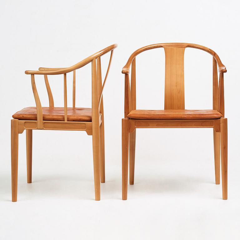 Hans J. Wegner, a pair of "China-Chair" in cherry wood, Fritz Hansen, Denmark, 1969.