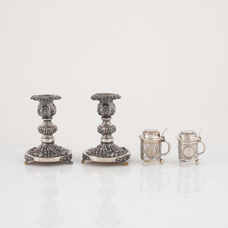 Candlesticks, a pair, Gustaf Möllenborg, Stockholm 1844, and two salt cellars including CG Hallberg, Stockholm 1897.