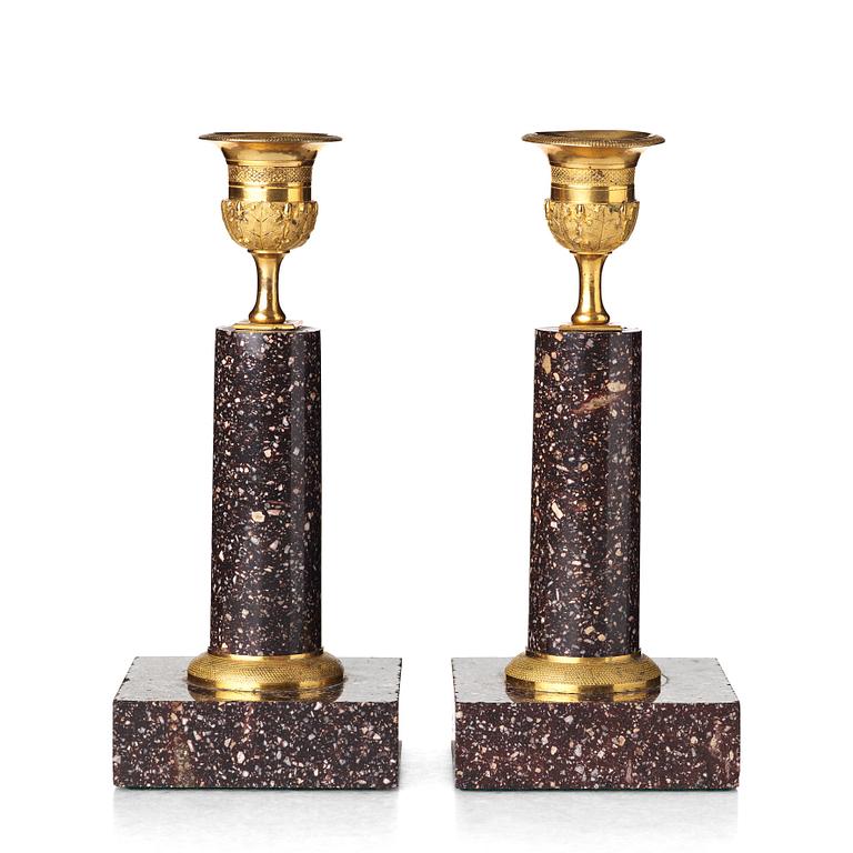 A pair of Swedish Empire candlesticks, early 19th century.