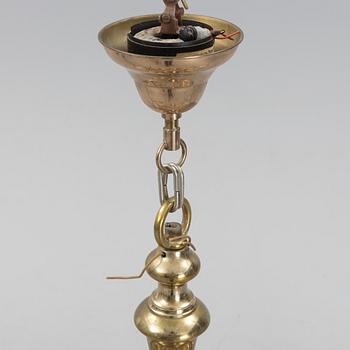 A brass Baroque style chandelier, 20th Century.