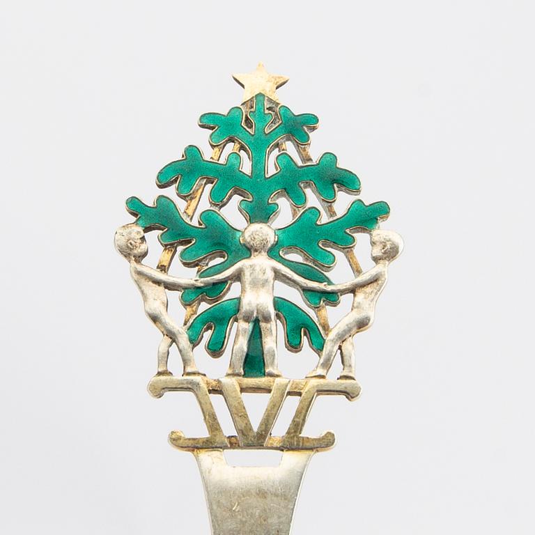 Anton Michelsen, Christmas cutlery, 21 pieces, gilded sterling silver and enamel, Denmark total weight 888 grams.