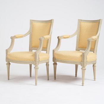 A matched pair of Gustavian armchairs, one signed by Johan Lindgren Stockholm.