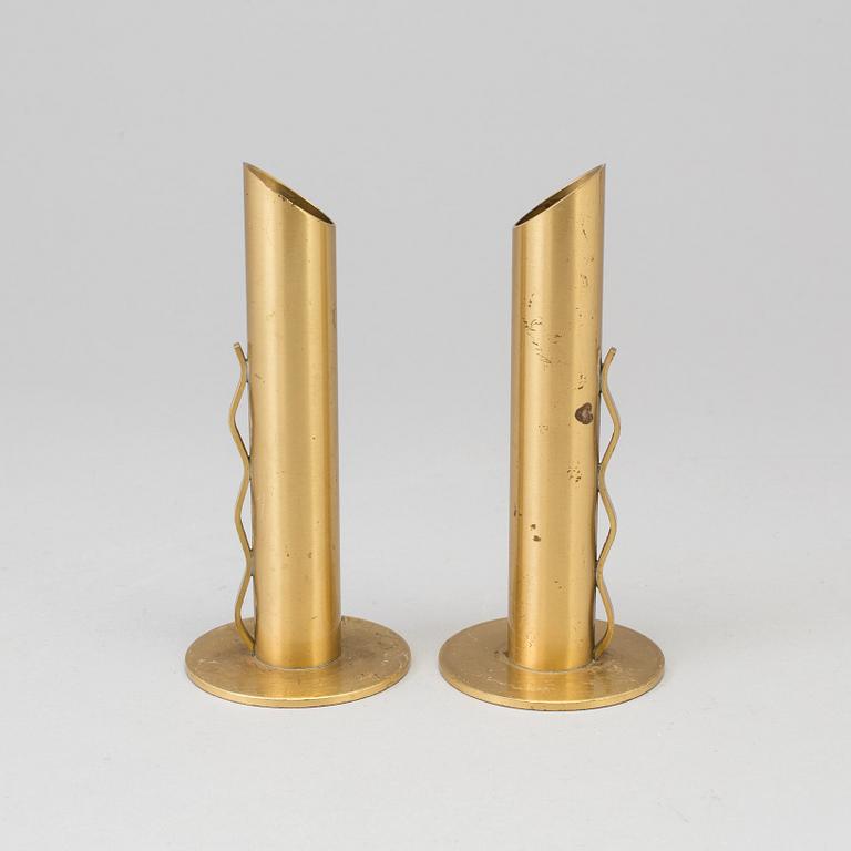 A pair of Swedish brass candlesticks/vases, mid 20th Century.