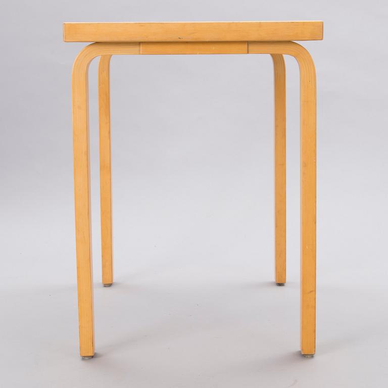 A mid-20th Century table, Artek.