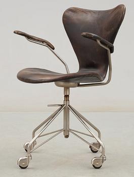 An Arne Jacobsen black leather 'Series Seven' Swivel Chair, Fritz Hansen, Denmark 1950-60's.