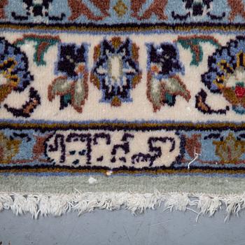 A carpet, an old Kashan, ca 554,5 x 351,5-358 cm, an inscription: Kashan Tavasoli.