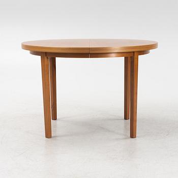 A round teak dining table, second part of the 20th Century.