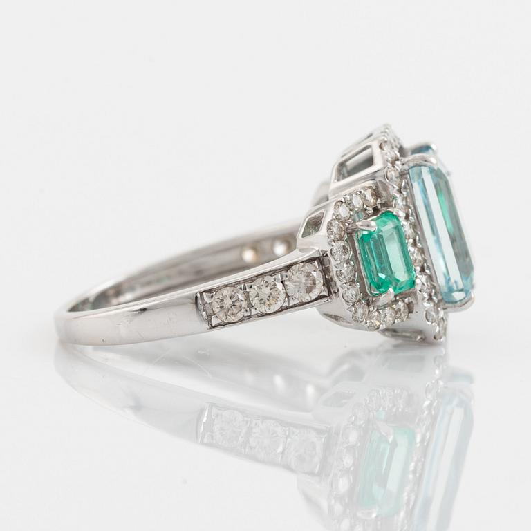 Aquamarine, emerald and brilliant-cut diamond ring.