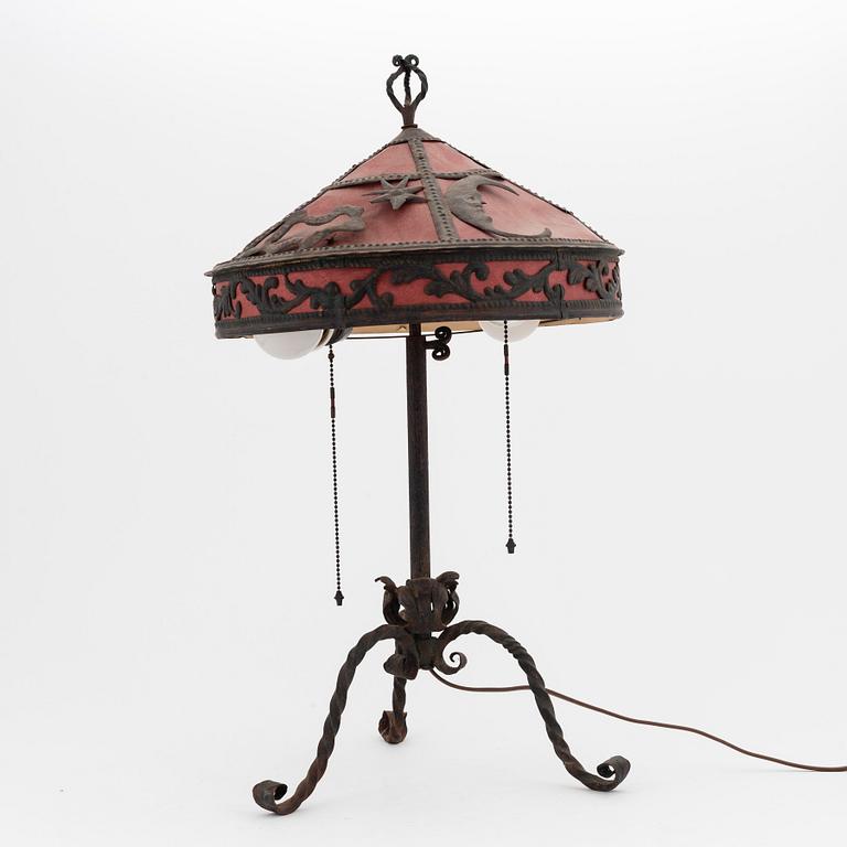 A wrought iron table light, 1920's.