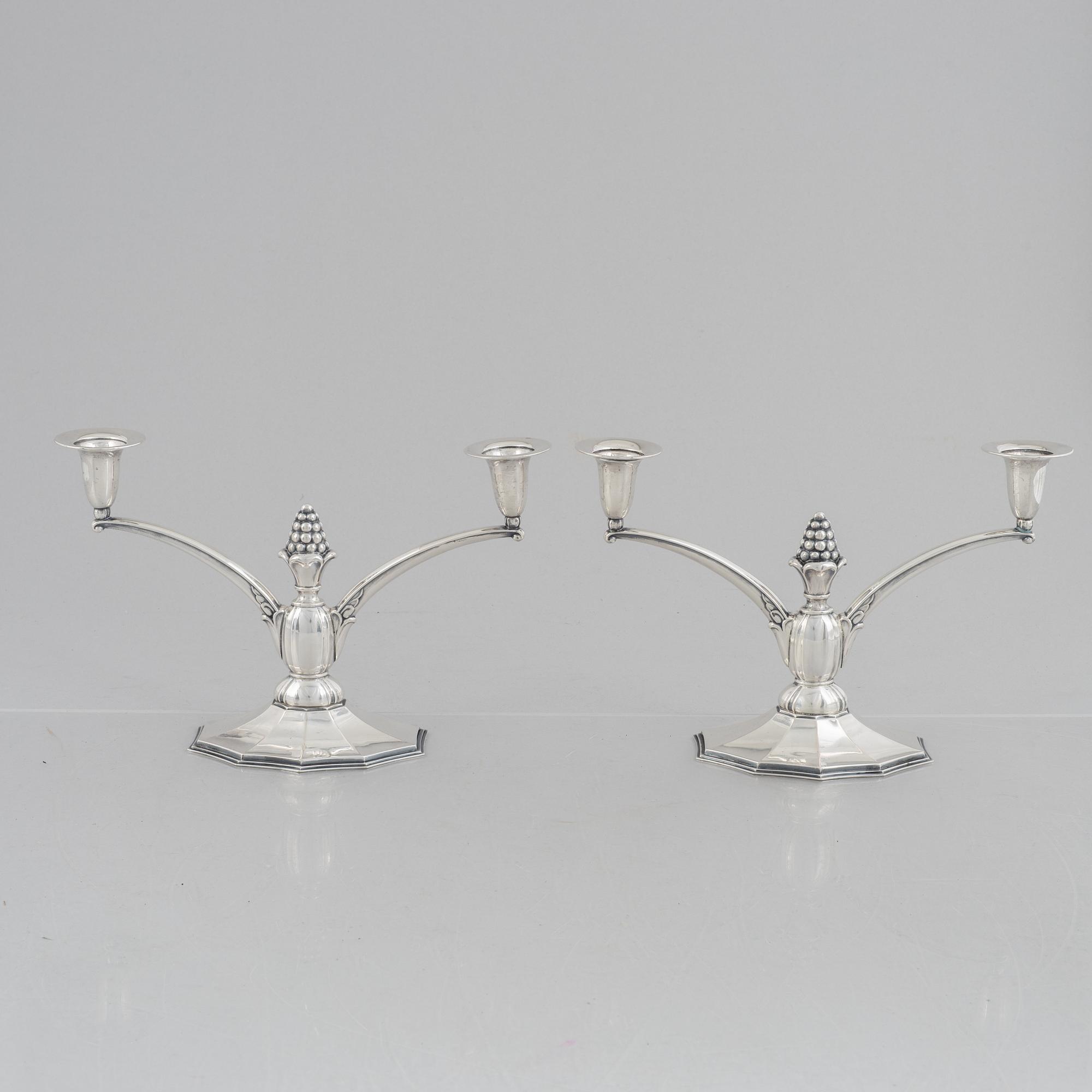 A pair of silver candelabra, Swedish import marks, probably 1920's/30's.