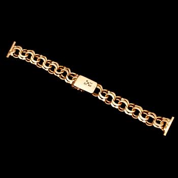 KLOCKARMBAND, 18 k guld, 1947, Bismarck. Vikt ca 35 g.