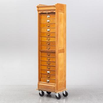 An oak file cabinet, first half of the 20th century.