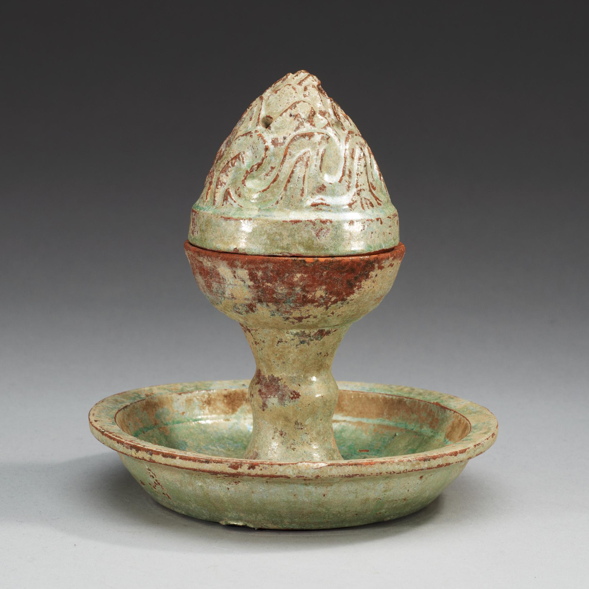A green glazed boshan-lu censer with cover, Han dynasty (206 BC - 220 AD).