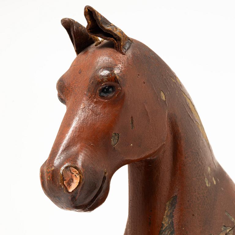 A toy horse, early 20th century.