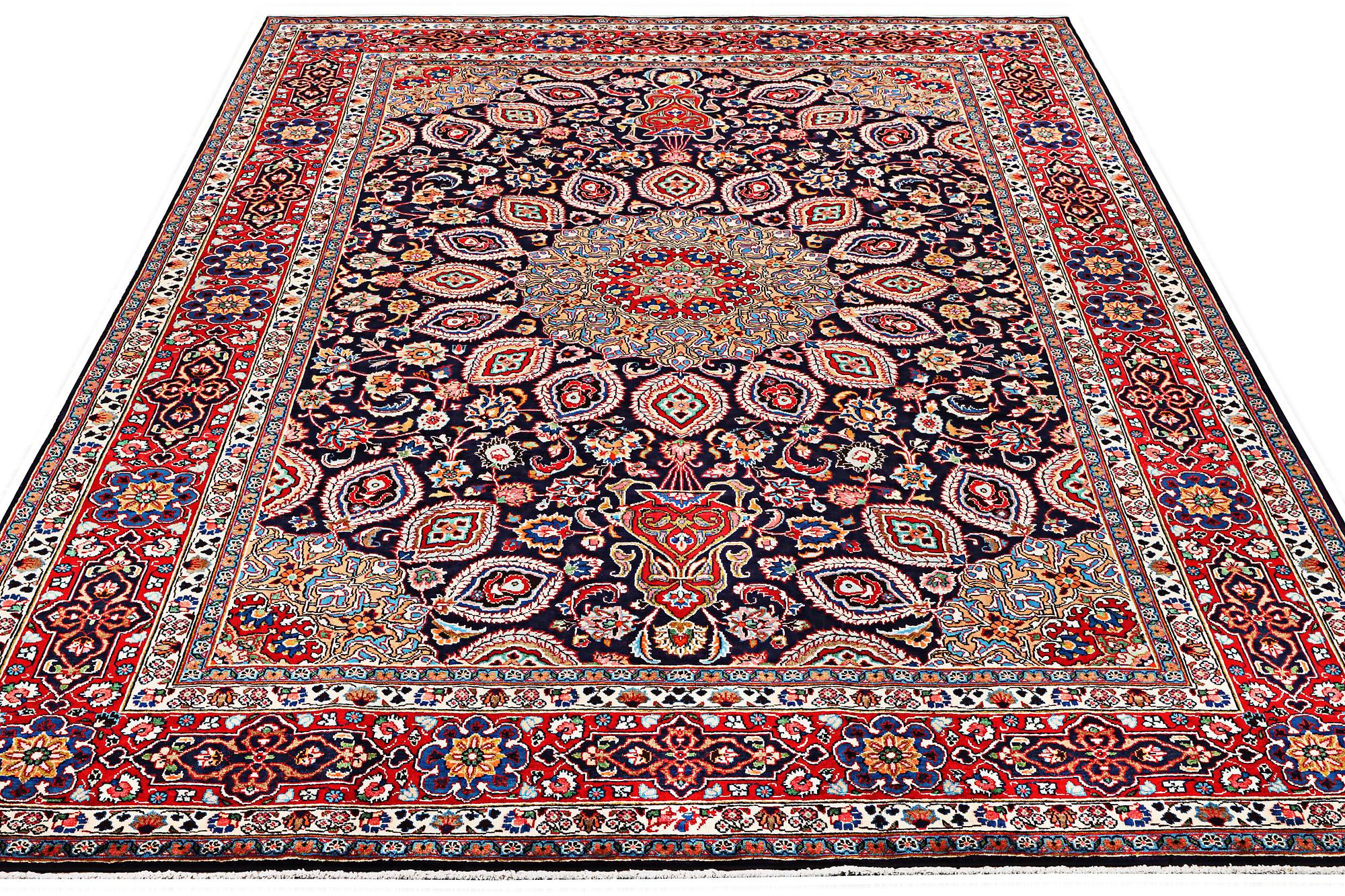 A Meshed carpet, c. 352 x 255 cm.