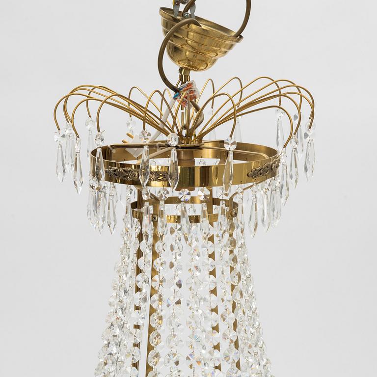 A contemporary Empire style chandelier for eight candles.