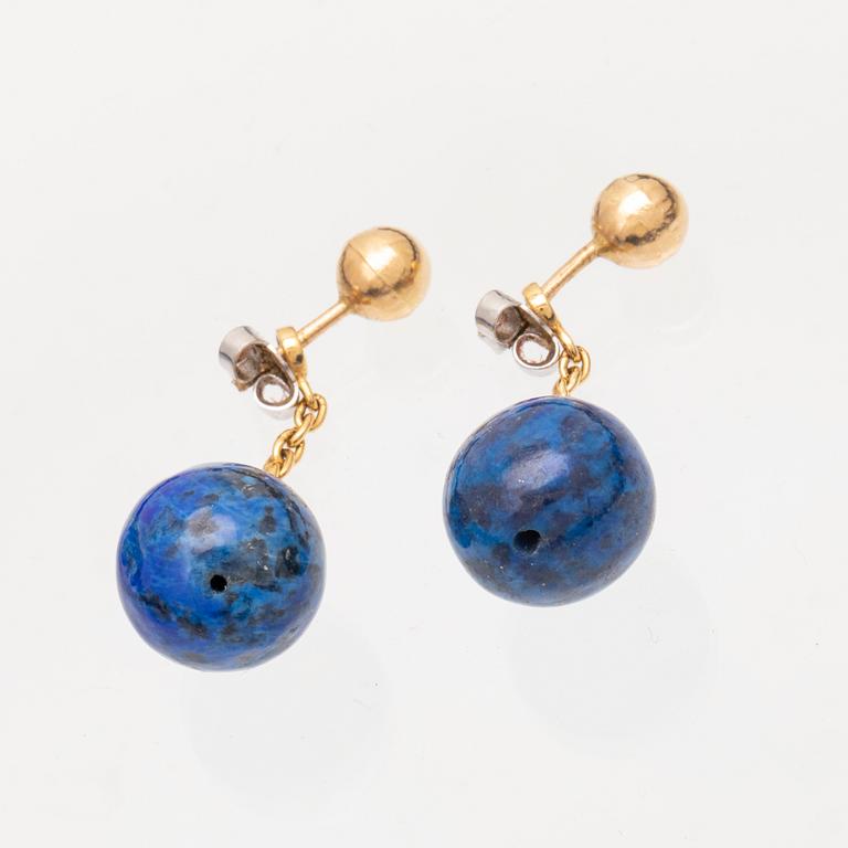 A set of lapis lazuli earrings and necklace.