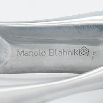 A metal shoe horn by Manolo Blahnik, 2000s.