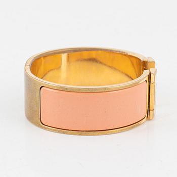 Hermès, a 'Clic Clac H' bracelet.