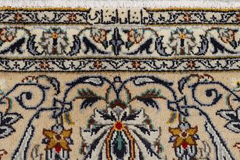A Kashan carpet, c. 387 x 290 cm.