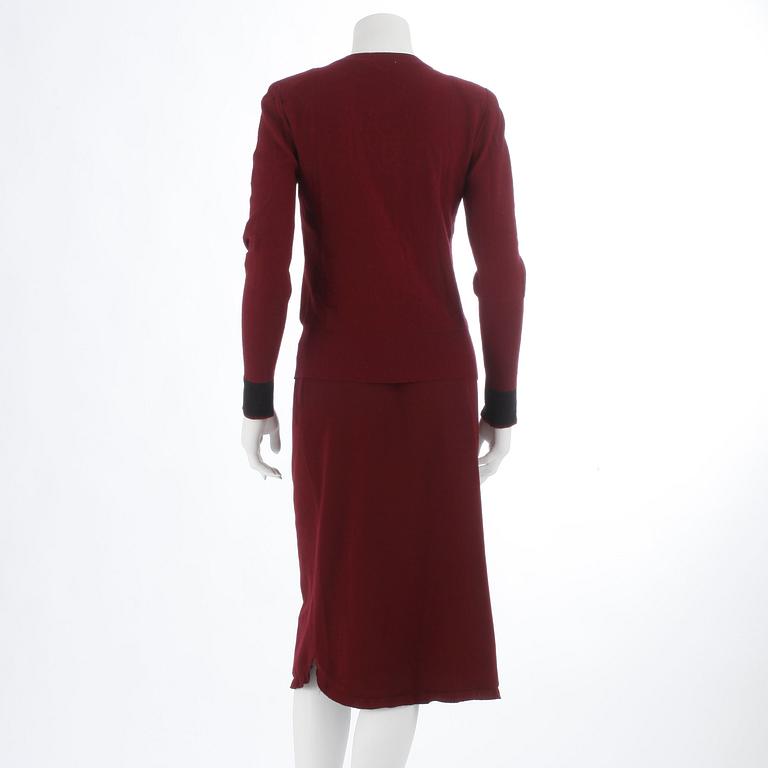 SONIA RYKIEL, a burgundy red sweater and skirt.