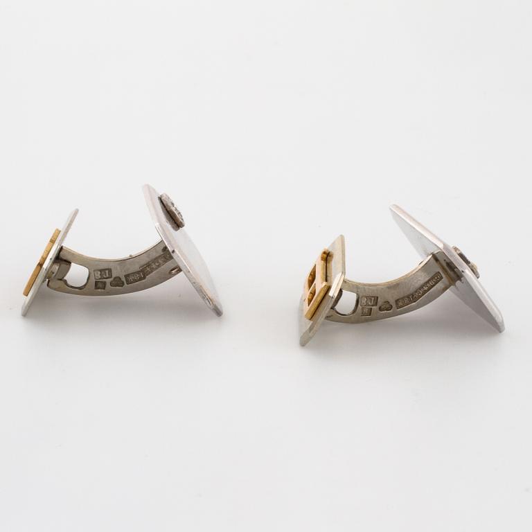 A pair of brilliant cut diamond cufflink by Gustav Dahlgren & Co, Malmö, 1945.