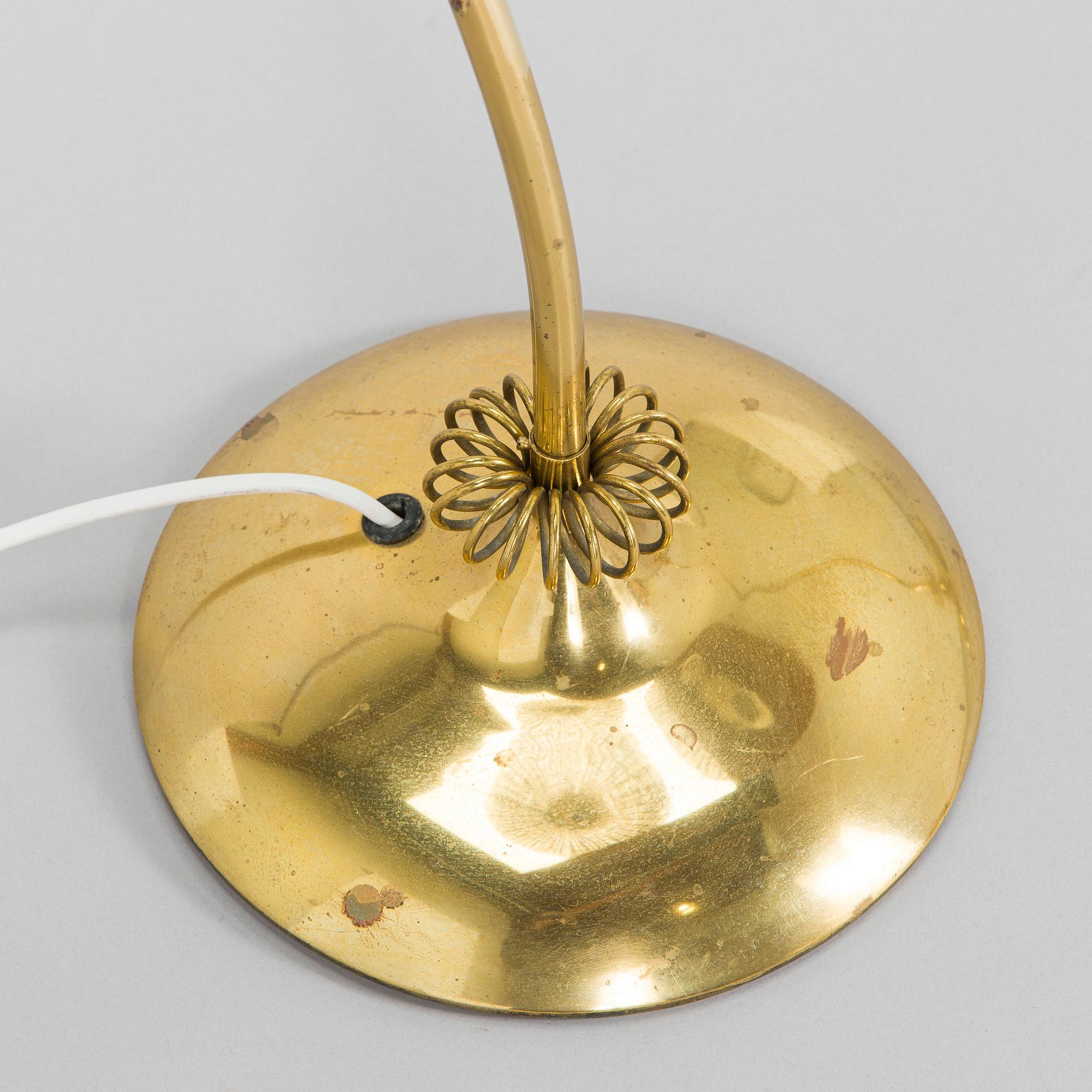 A pair of mid-20th century floor lamps.