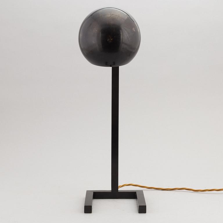 A contemporary table lamp.