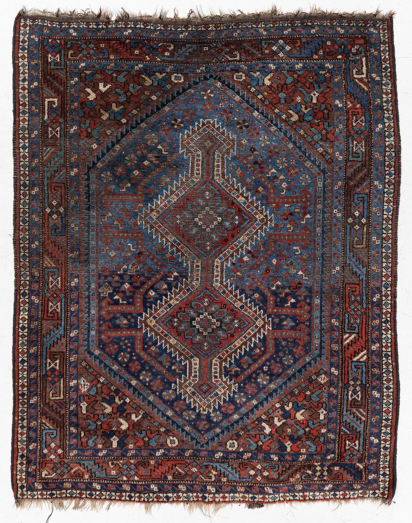 A Khamseh rug, antique, c. 192 x 155 cm.