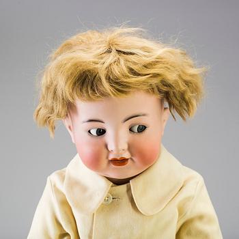 A bisque head doll 126 by Kämmer & Reinhardt/Simon & Halbig, Germany, ca 1914.