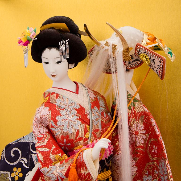 A latter half of the 20th century Japanese doll in showcase.