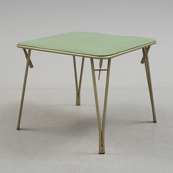 A table and four chairs by Dipetrol, second half of the 20th century.