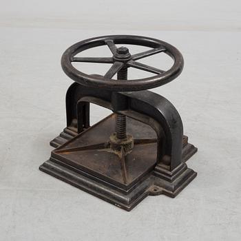 A cast iron book press from around year 1900.