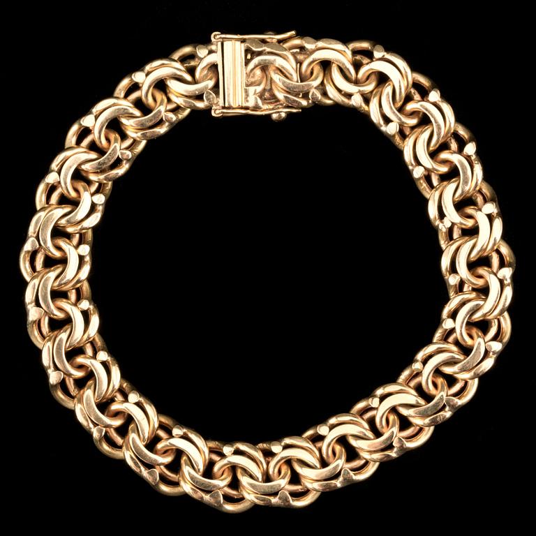 ARMLÄNK, 18 k guld, bismarklänk, Åhrlings Guldsmedsverkstad Kurt, Stockholm, 1949. Vikt ca 50 g.