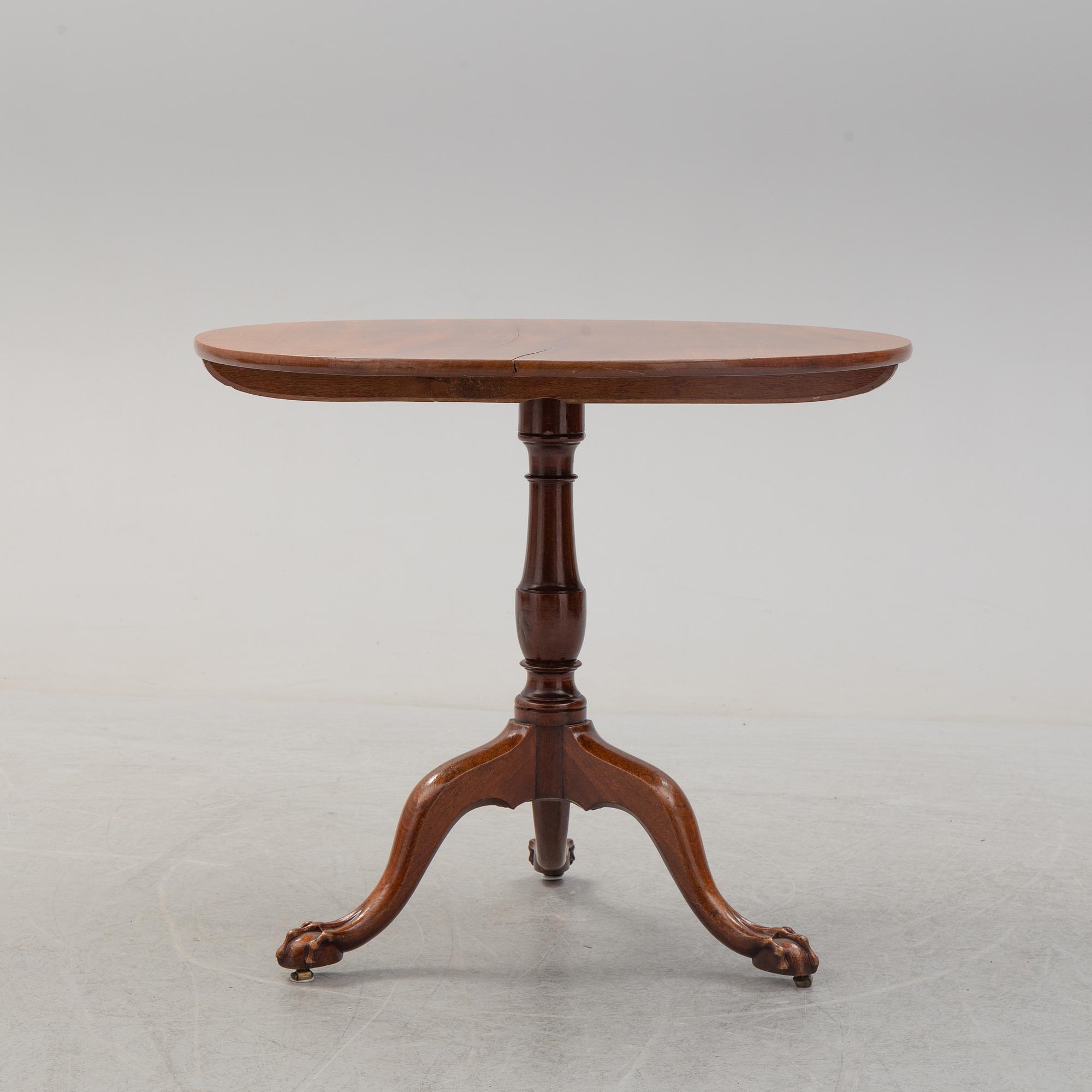An 18th Century mahogany table.