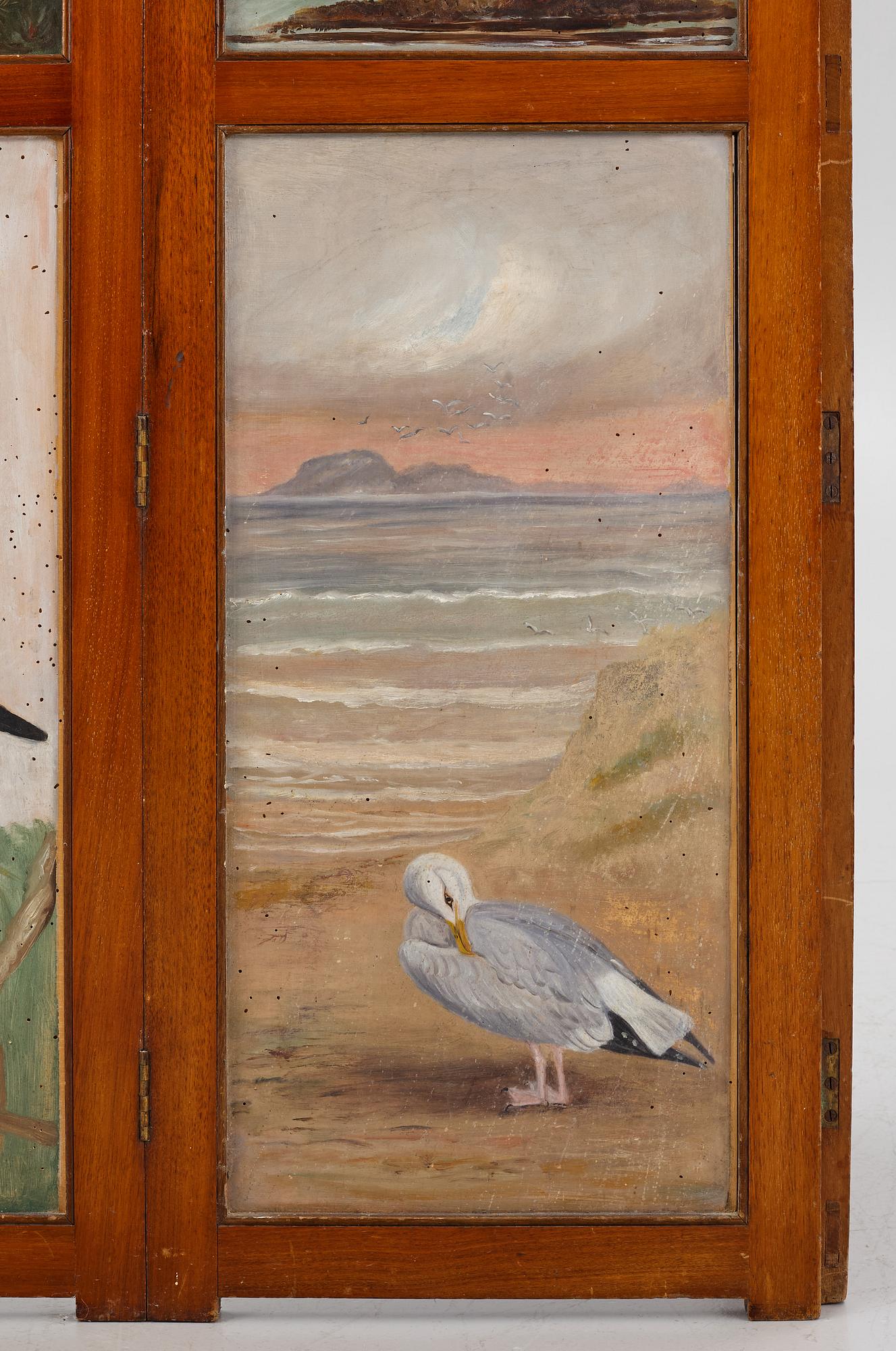 A folding screen, late 19th century.