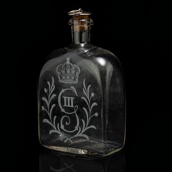 A set of five snapps glasses and a snapps bottle, with Gustav III crowned monogram. 20th century, Baroque-style.