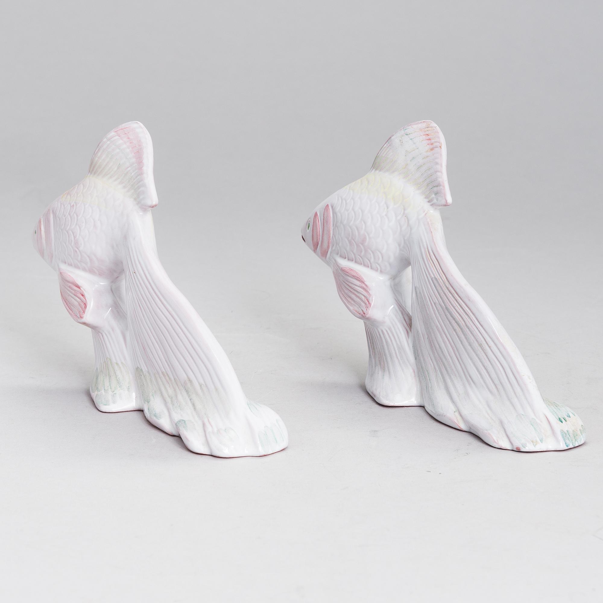 A pair of figurines by Michael Schilkin for Arabia.