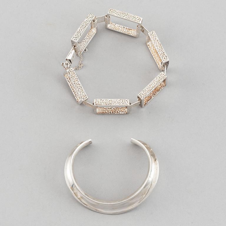 Two silver bracelets, including Denmark.