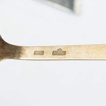 Anton Michelsen, Annual/Christmas cutlery, 8 pieces, gilt sterling silver and enamel, Denmark, 1930s–40s.