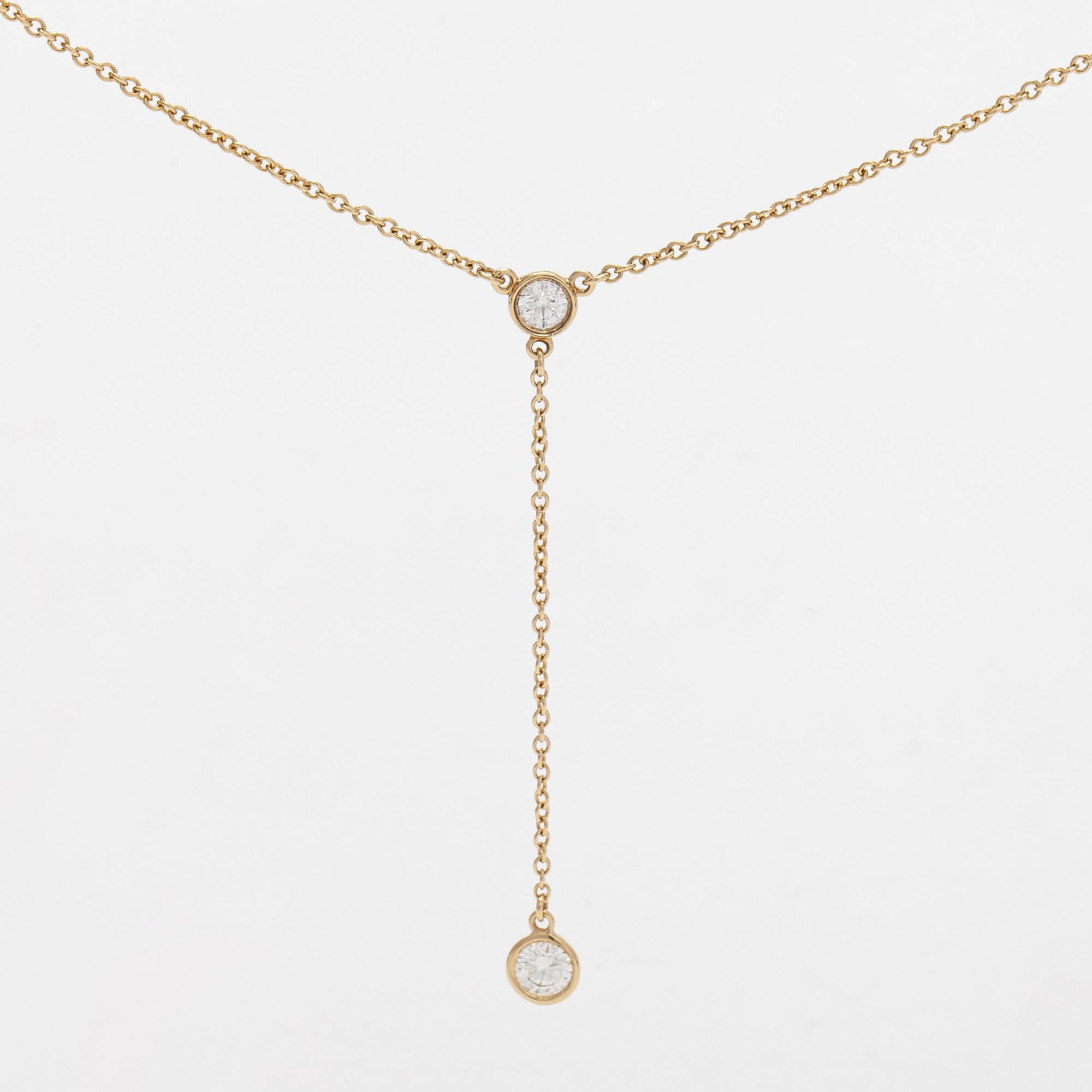 Tiffany & Co, Elsa Peretti, kaulakoru, "Diamonds by the Yard", 18K kultaa ja kaksi briljanttihiottua timanttia.