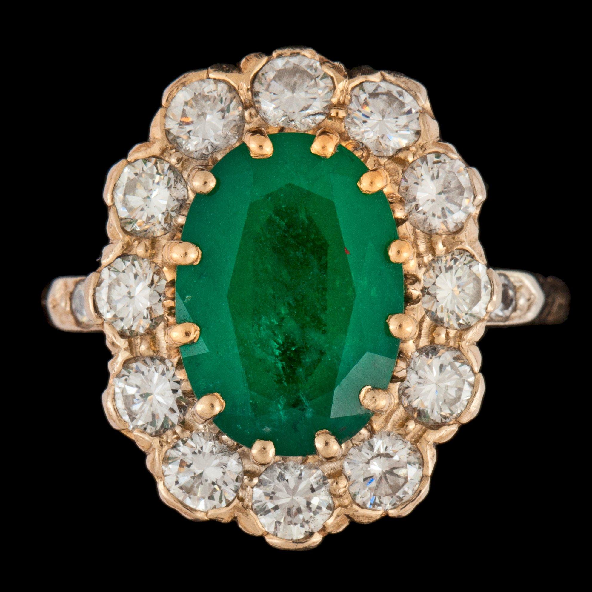 A emerald app. tot. 3.00 cts and diamond app. tot. 2.00cts ring.