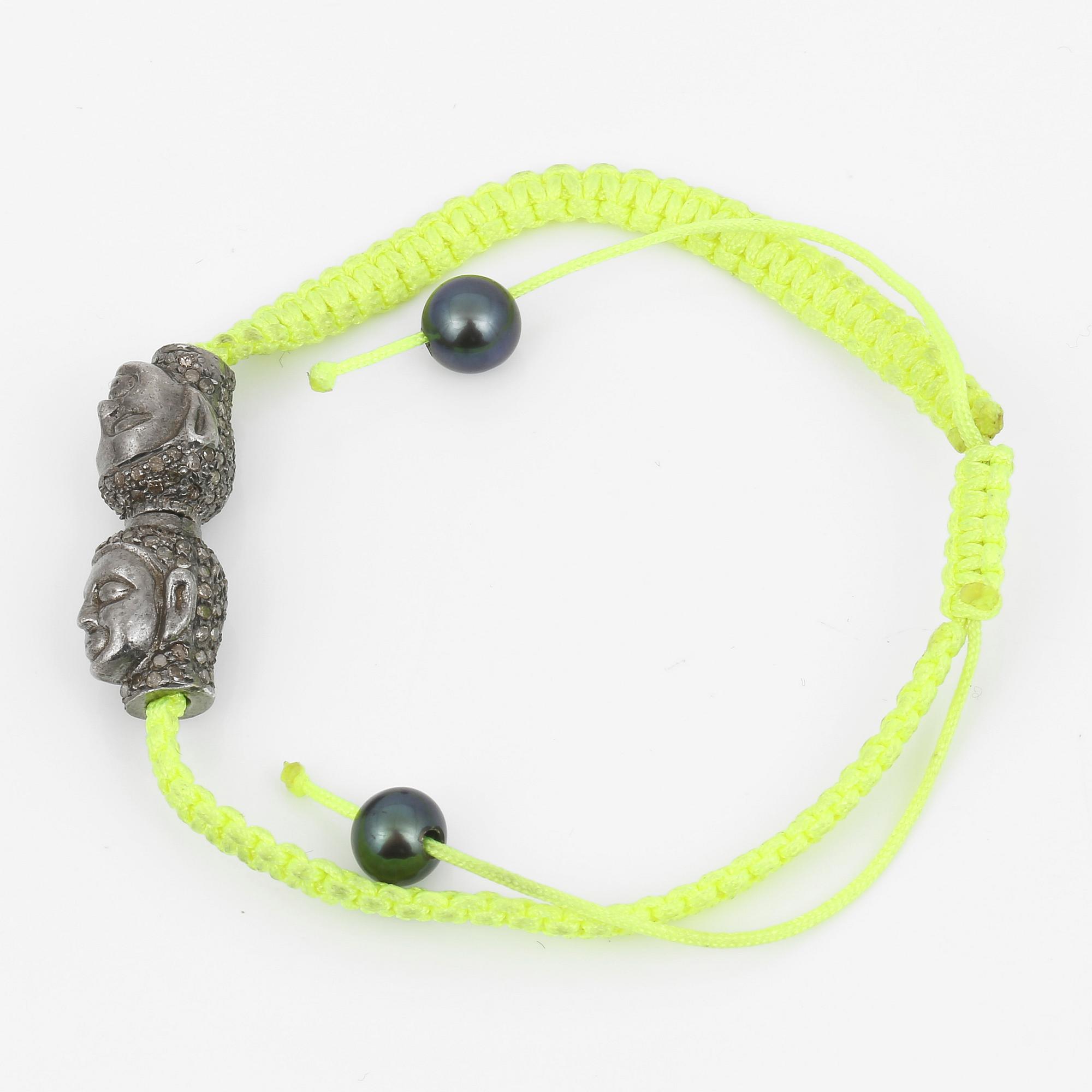 ARMBAND, tråd samt silver med svarta sötvattenspärlor och åttkantslipade diamanter.