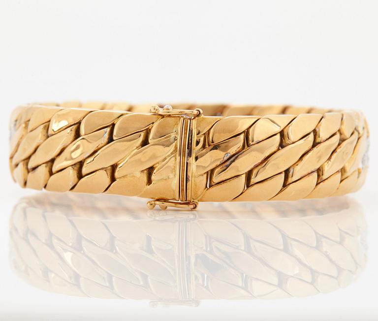 Bucherer armband 18K guld med runda briljantslipade diamanter.